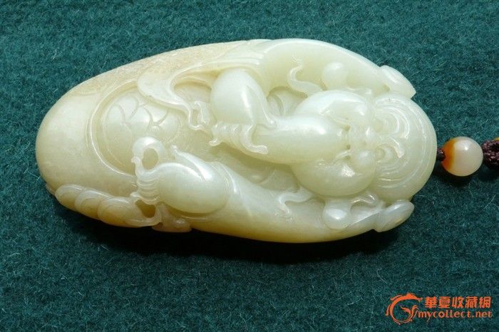 《联合拍卖》:和田青白玉籽料《财神》大手把