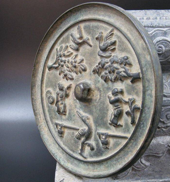 宋代花鸟人物纹铜镜图6