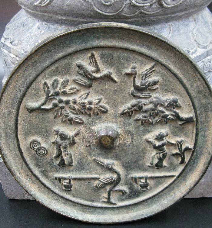 宋代花鸟人物纹铜镜图7