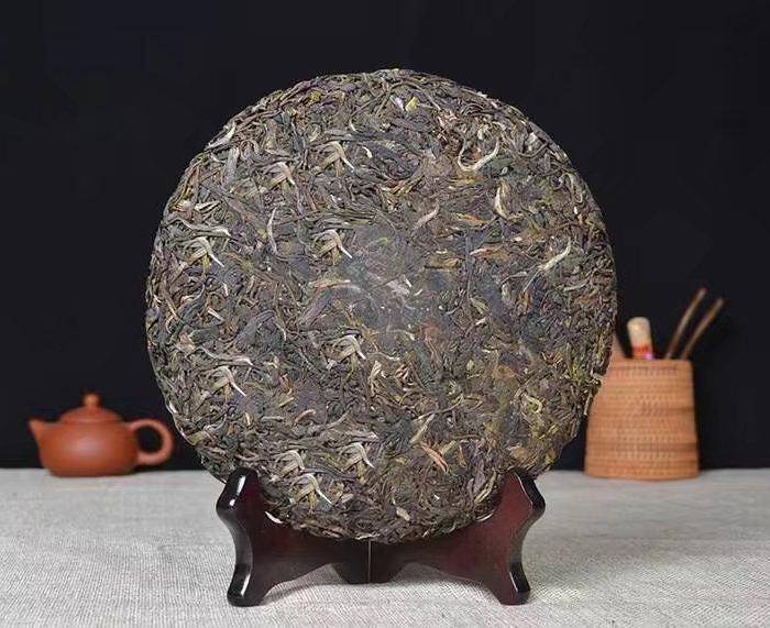 2012年云南特产 越陈越香普洱茶 357g普洱饼茶五年 生茶图2