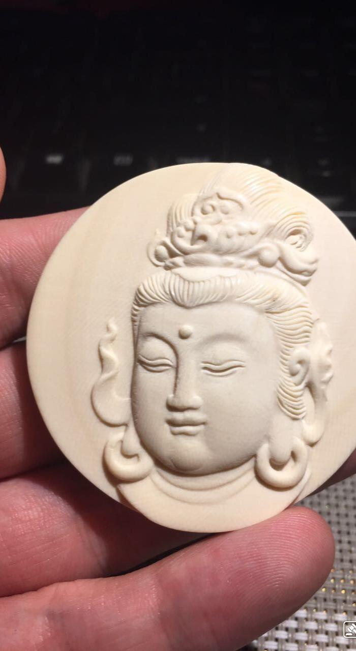 万年保真的猛犸牙菩萨纹的大圆牌