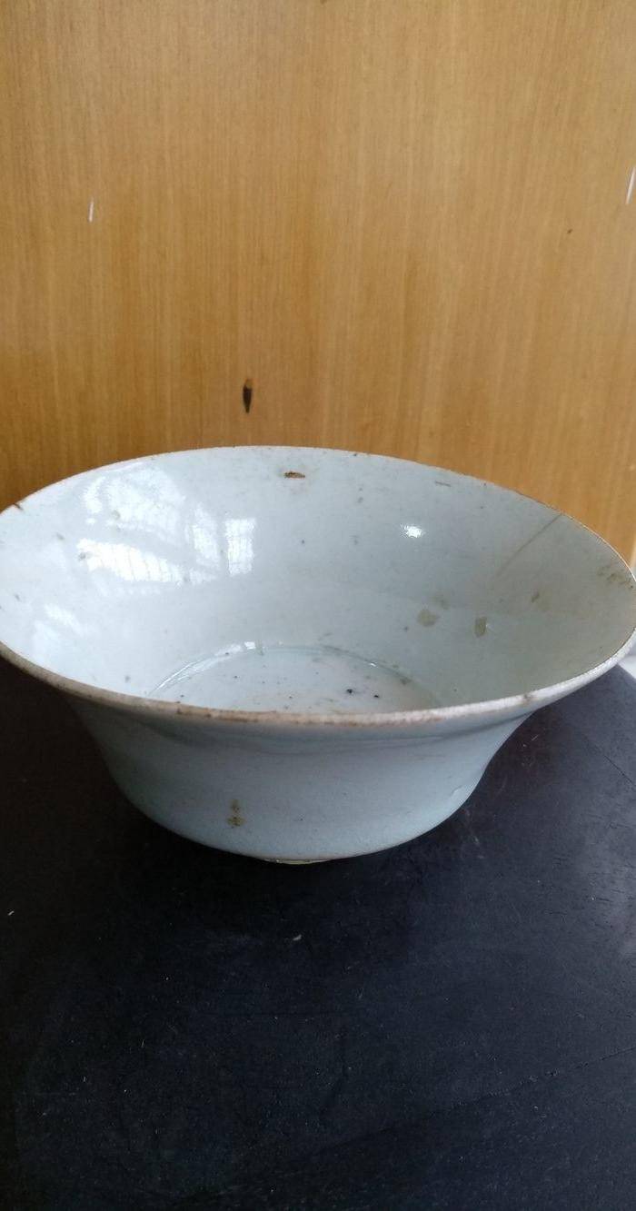 元枢府釉小底足折腰碗,高5.5Cm,口径11.4. 11Cm。图5