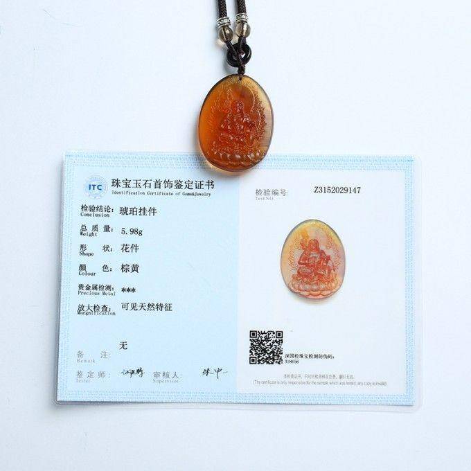 棕红缅甸琥珀不动明王吊坠 80KM36图11