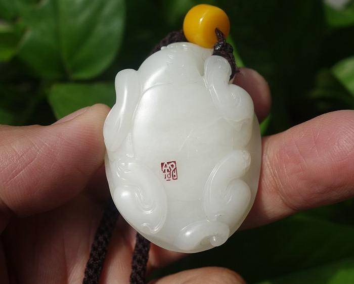 黄铭工作室出品,白玉籽料撒金皮龙龟图5