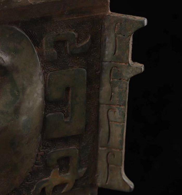 商代人面青铜鼎图4