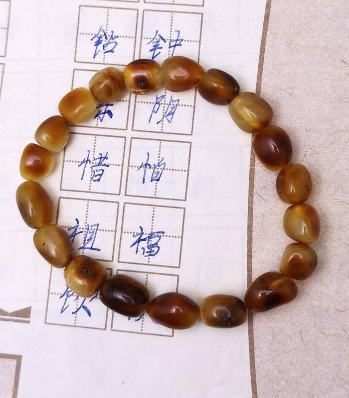 精品 10.55克红皮蜜蜡籽料手串图2