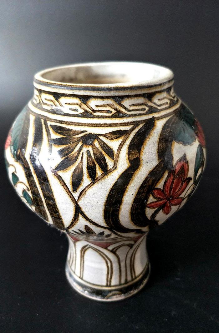 宋磁州窑彩绘攀枝娃娃纹鸡腿罐